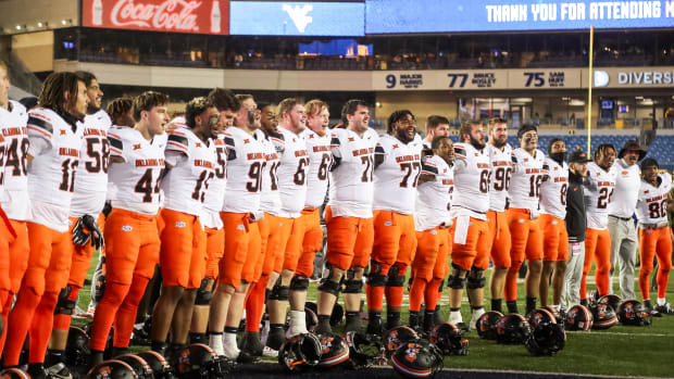 Oklahoma State celebrates win over West Virginia in Morgantown